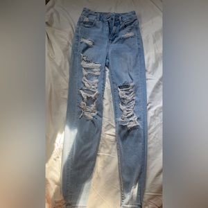 ripped denim jeans. American Eagle outfitters. size 000 next level stretch